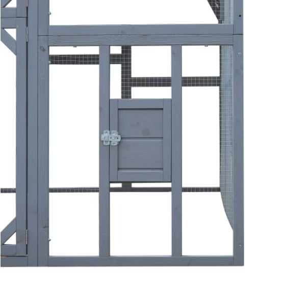Grey Metallic Cage Structure With a Door
