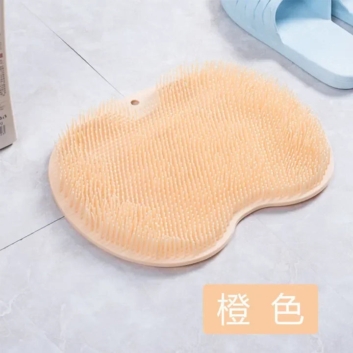 A Orange Color Shower Mat For Foot Massage And Comfort 