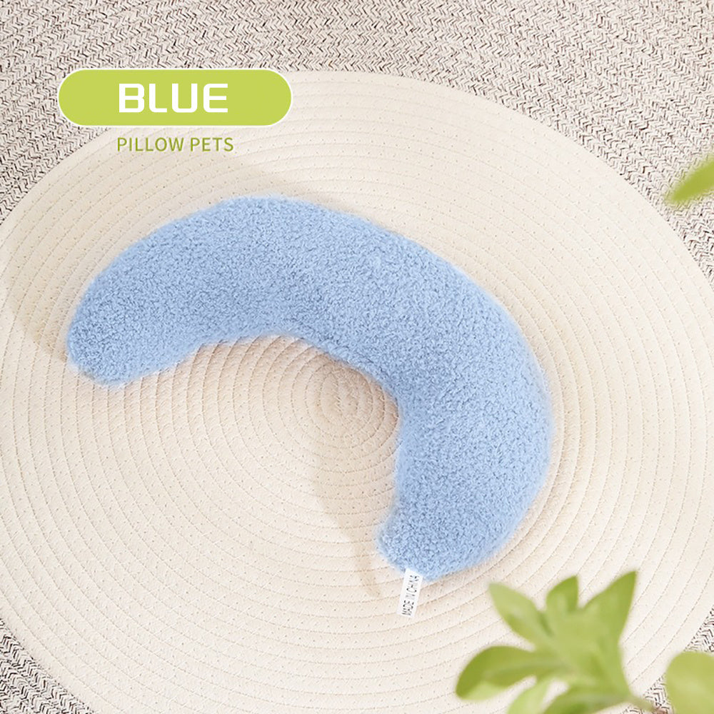 Blue pet pillow on a textured surface