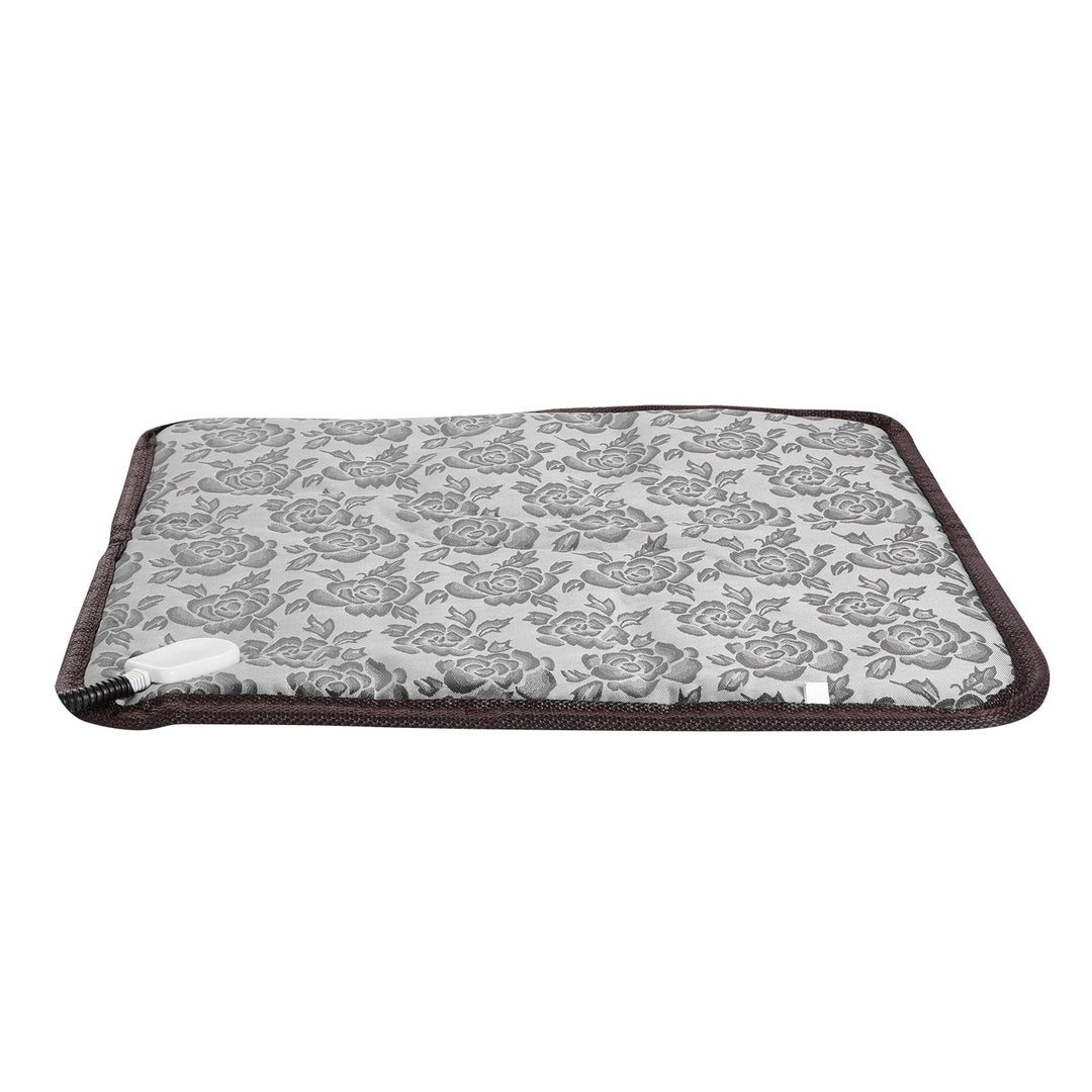 Chew-resistant pet warming pad with waterproof cover