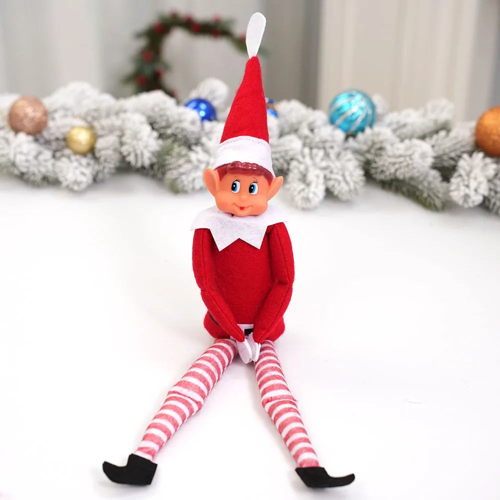 Christmas elf doll sitting on desk