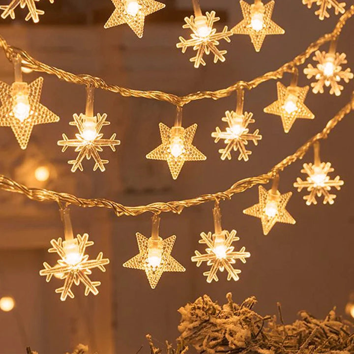 Christmas garden lighting with snowflake designs