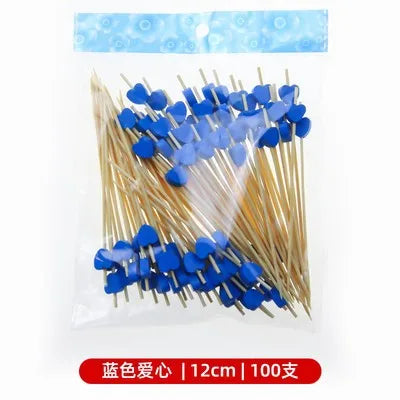 Disposable cocktail picks with heart tops