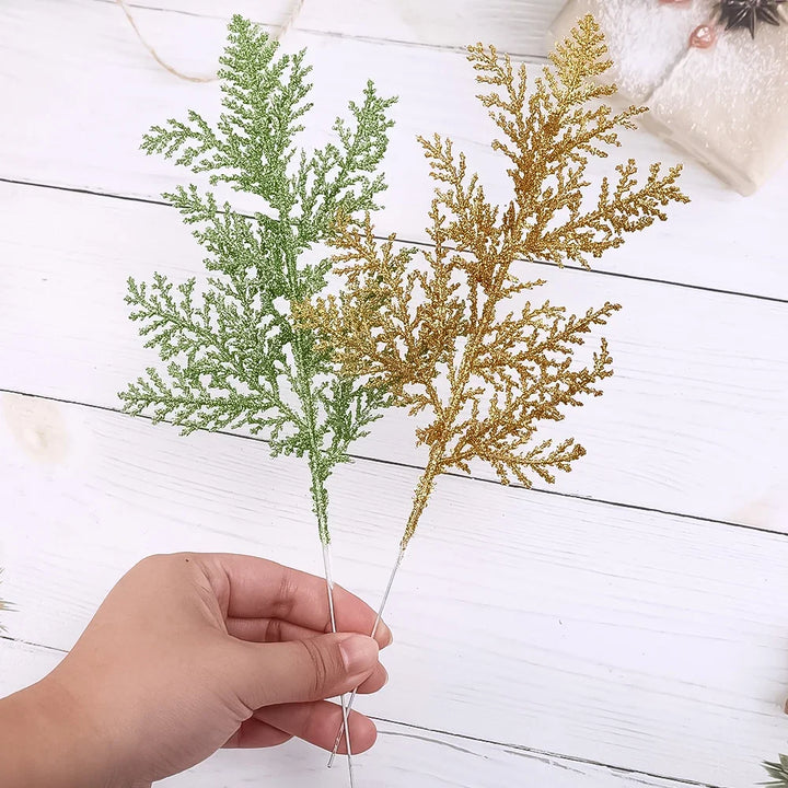 Festive gold leaves as tree ornaments