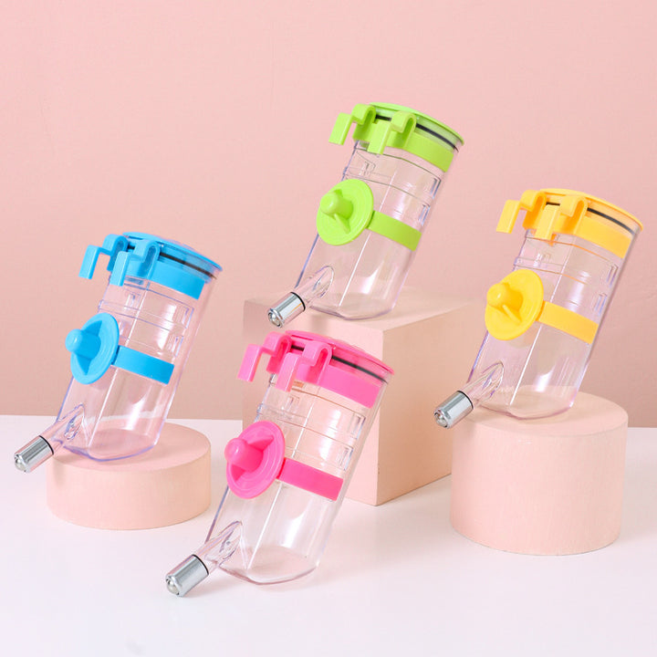 Four transparent pet water bottles with colorful lids