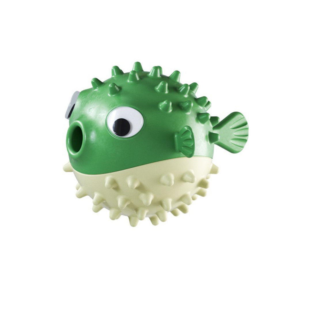 Green and beige puffer fish shaped toy 