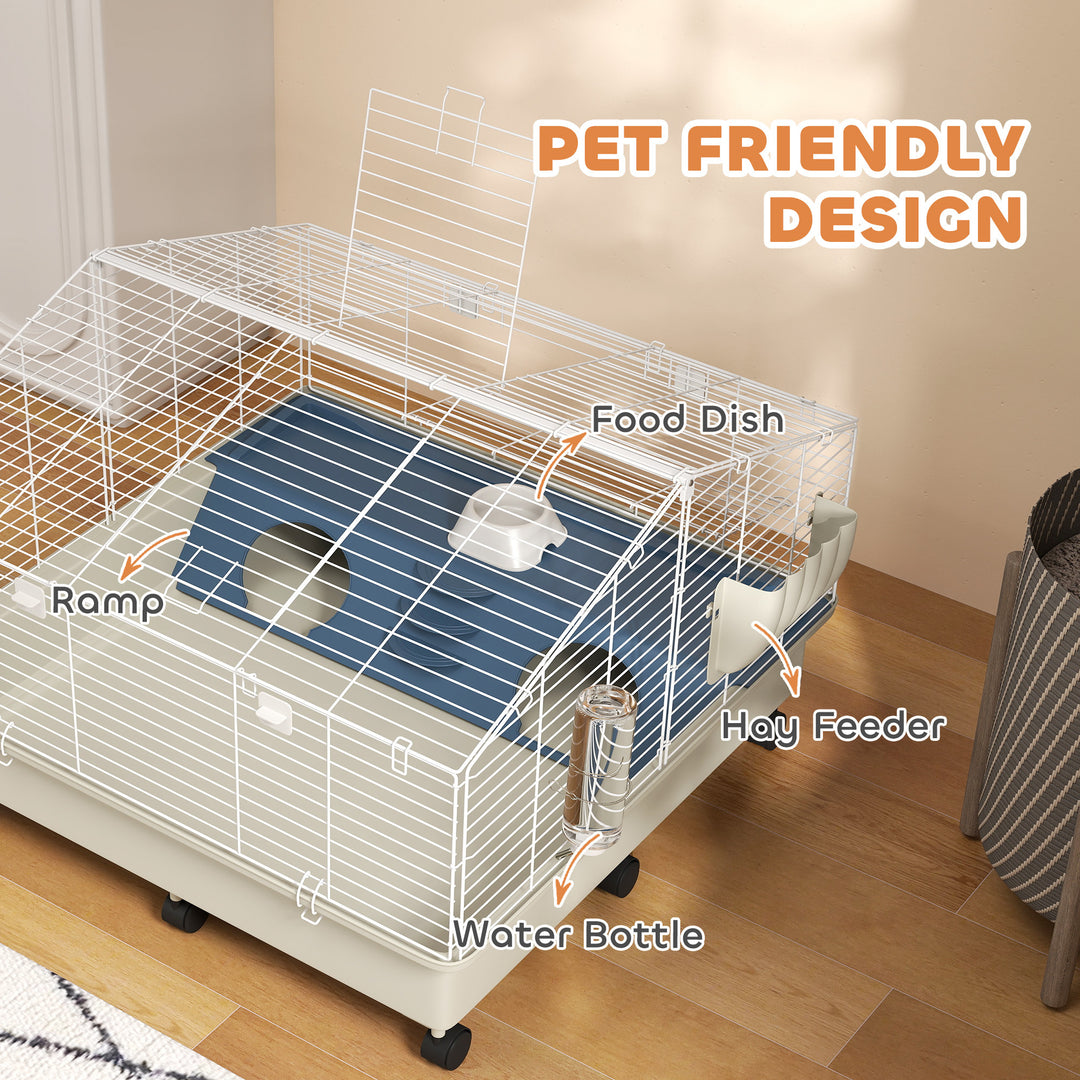 Guinea pig cage with wheels and feeder