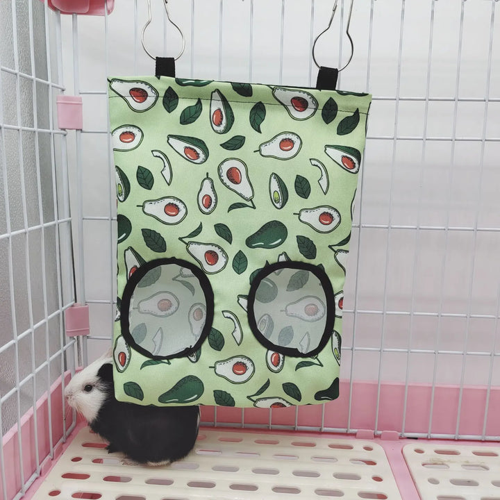 Guinea pig hay bag holder and dispenser.