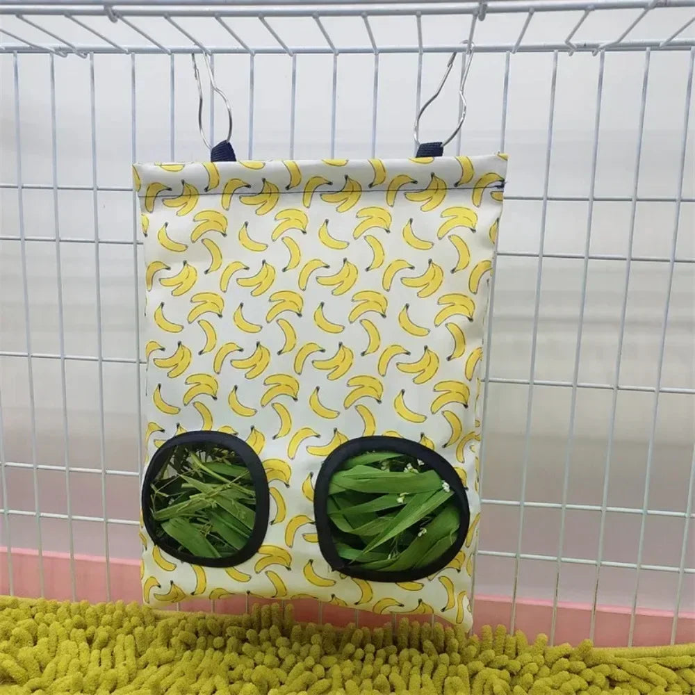 Guinea pig hay feeder bag with hooks.