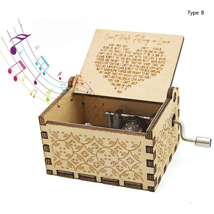 Hand-crank romantic music box with engraved details