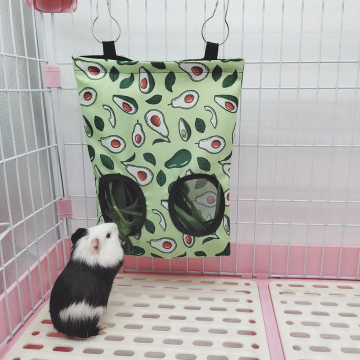 Hanging hay dispenser for rabbit cages.