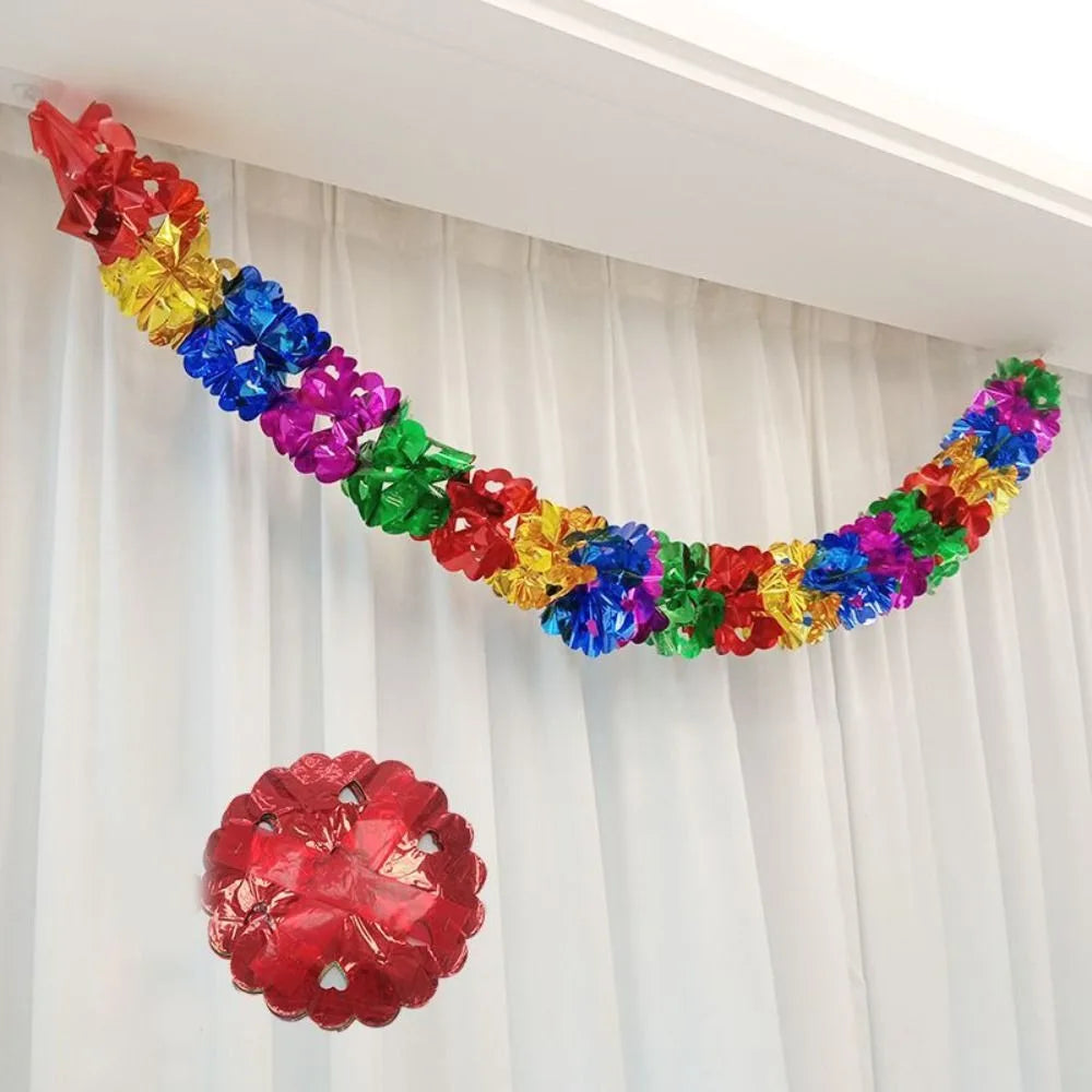 Party supplies featuring foil garlands