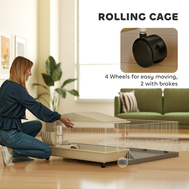 Person setting up a rolling pet cage with wheels