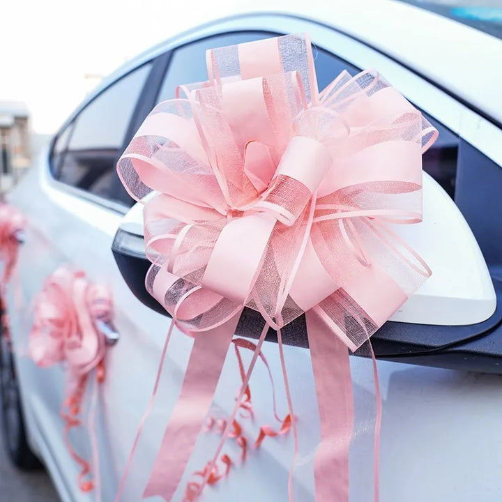 Romantic wedding car ribbon flowers