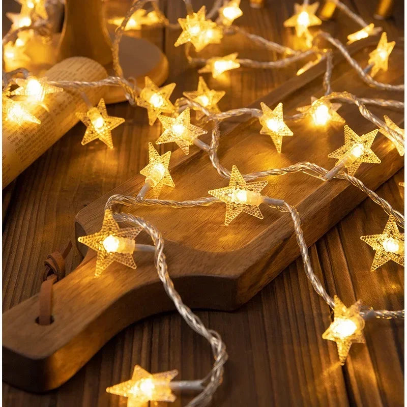 Star string lights illuminating a bedroom