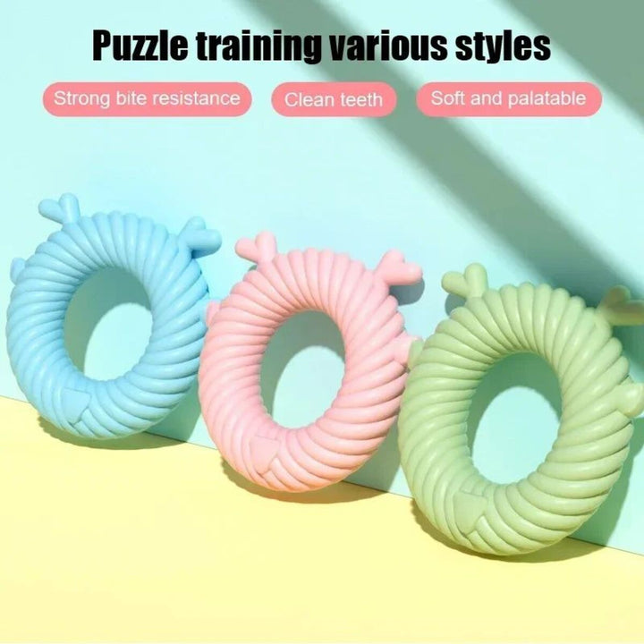 Three colorful spiral toys 