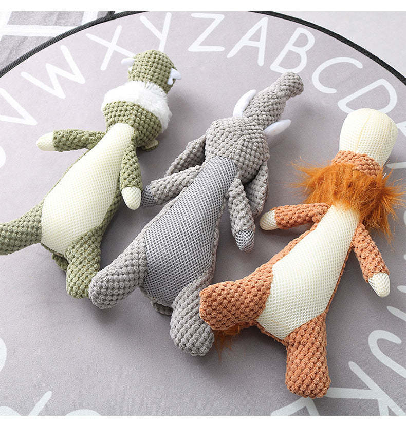 Three knitted dolls in green  gray and orange