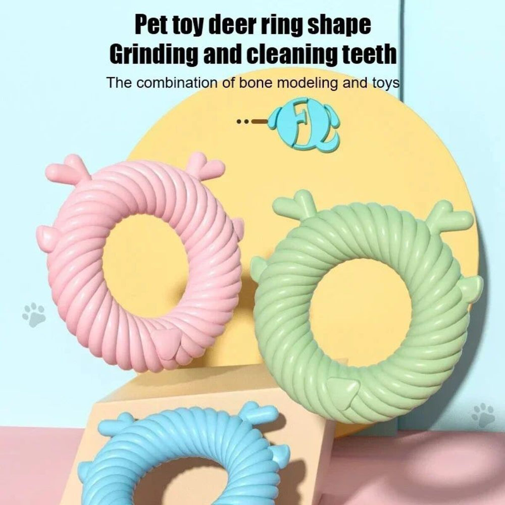 Three pet toys with deer ring shapes in pink green and blue 