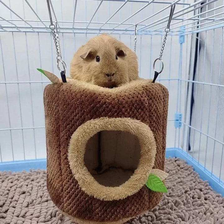 Tree stump hammock pet house