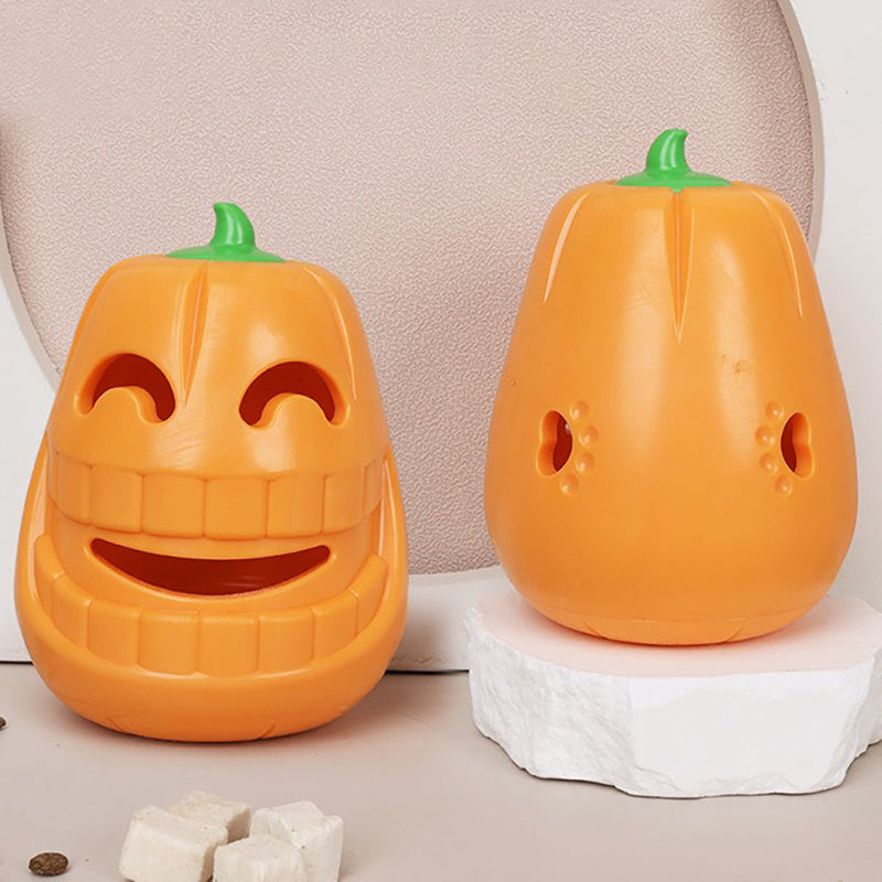 Two orange pumpkin shaped containers