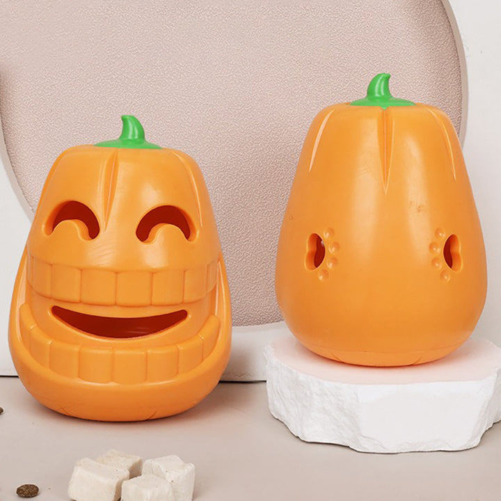 Two orange pumpkin shaped containers