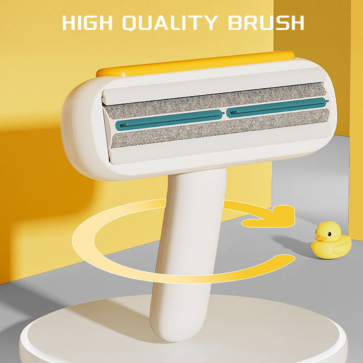 White and yellow cleaning brush with a rubber duck