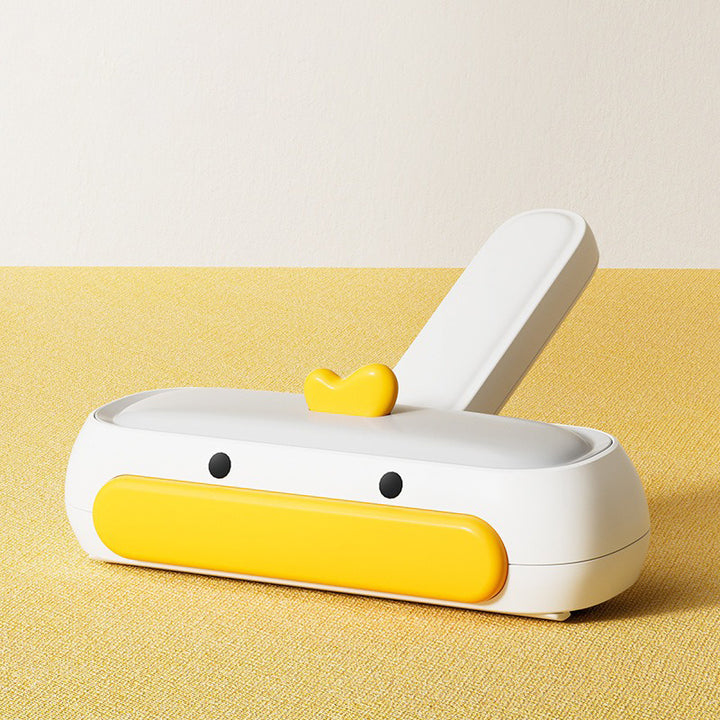 White and yellow hair removal device resembling a duck