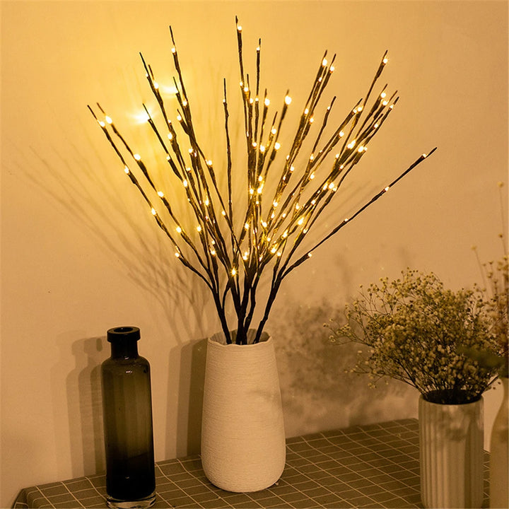 Willow branch lamp with glowing bulbs