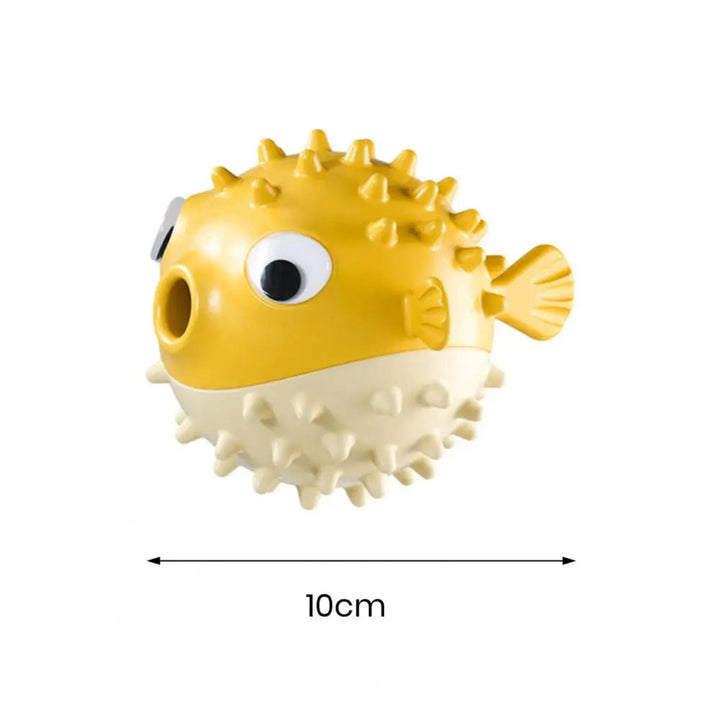 Yellow and white puffer fish-shaped object with measurement label 