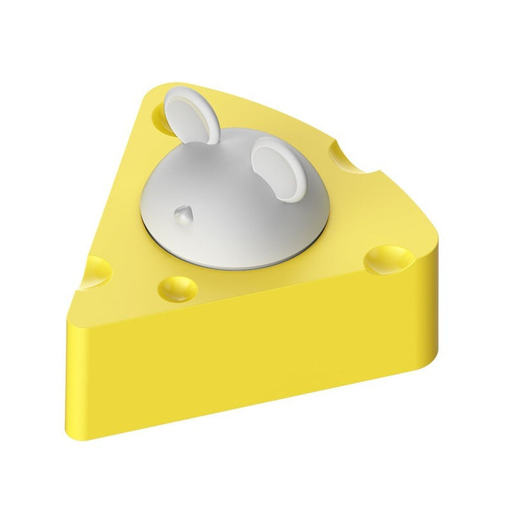 Yellow wedge shaped object with a gray center