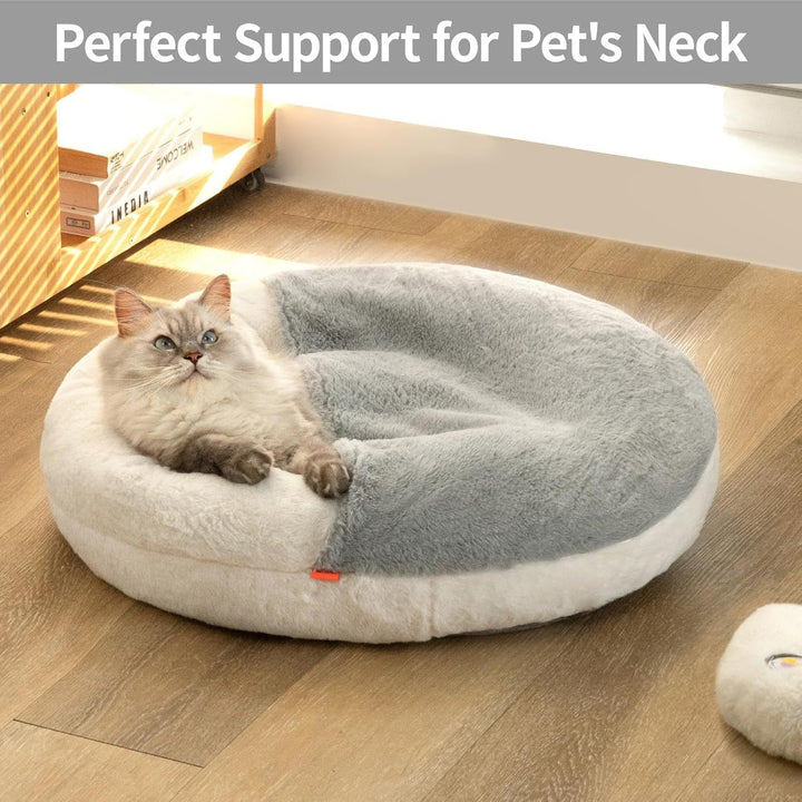 Cat lying on a round pet bed with 'Perfect Support for Pet's Neck